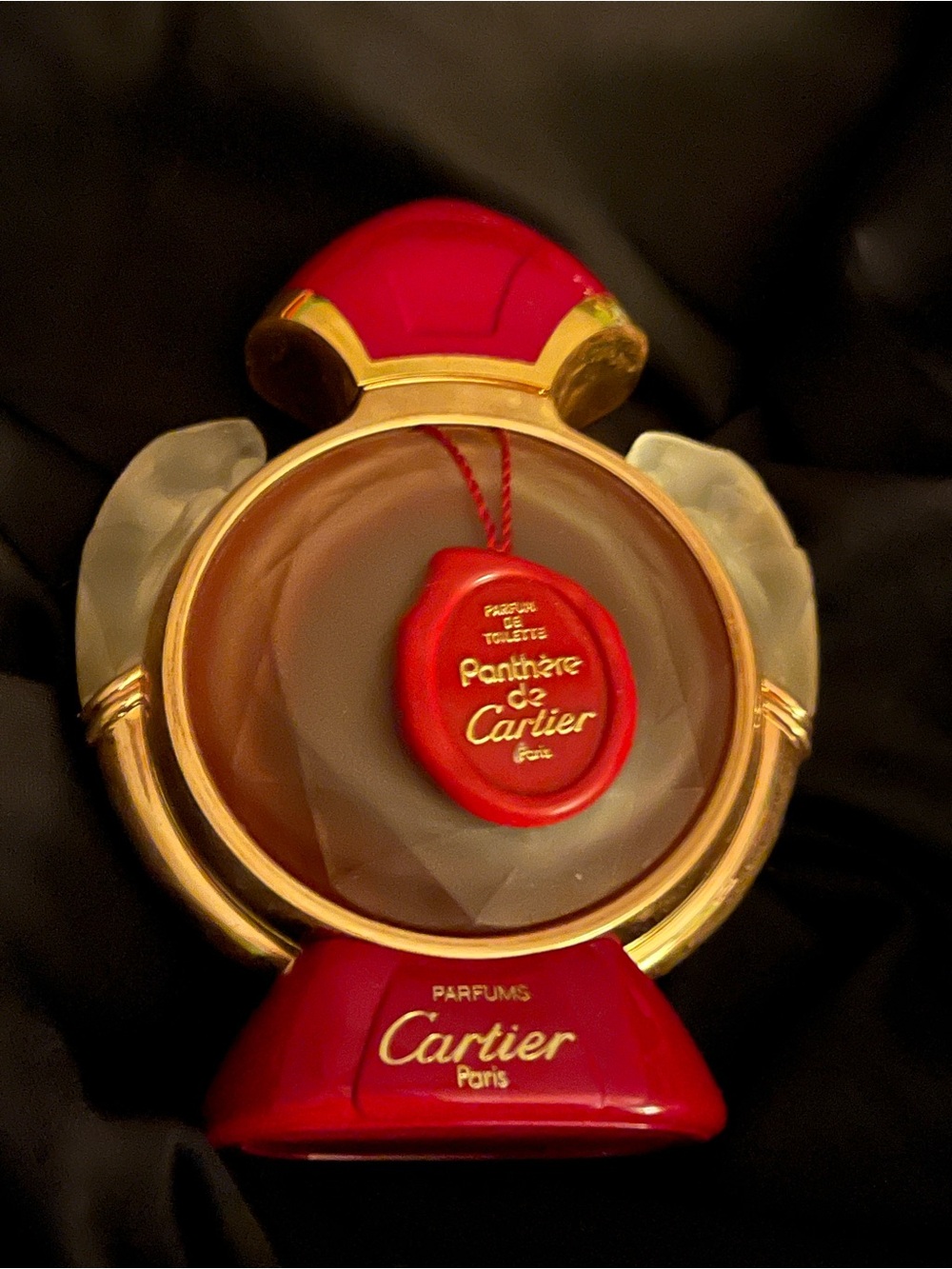 Cartier Panthère Bottle in Red and Gold Accents